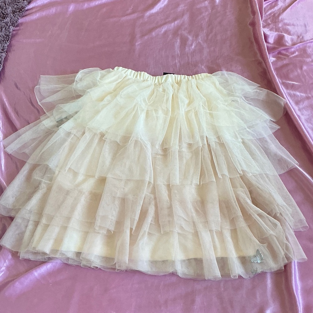 Good condition. Size xxs/but fits medium size.